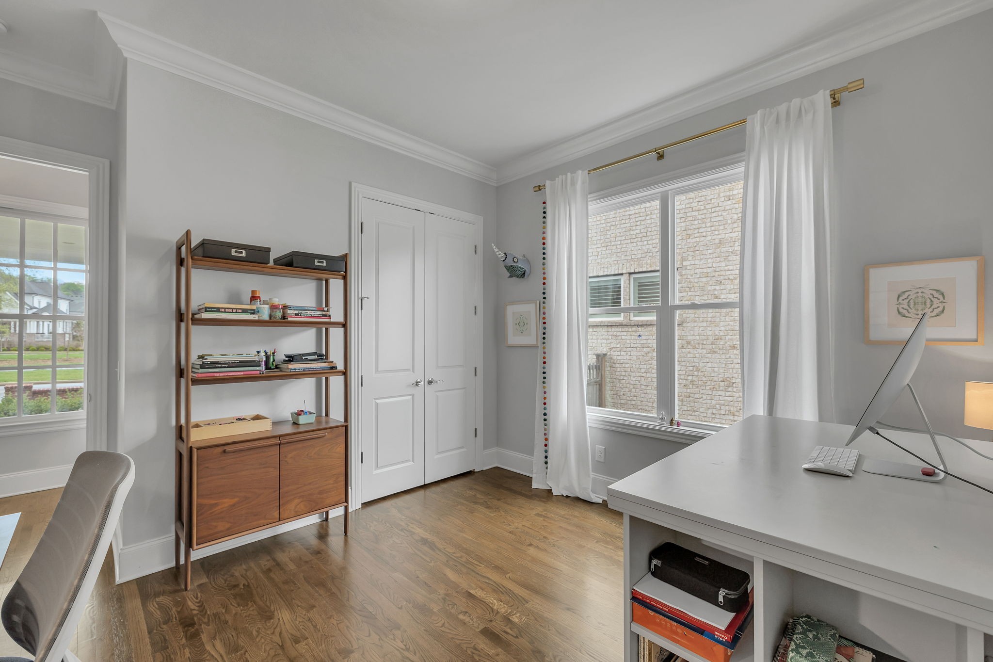 1606 Eliot Road Franklin, TN 37064 - Photo 10 of 49 a view of a workspace with furniture and wooden floor