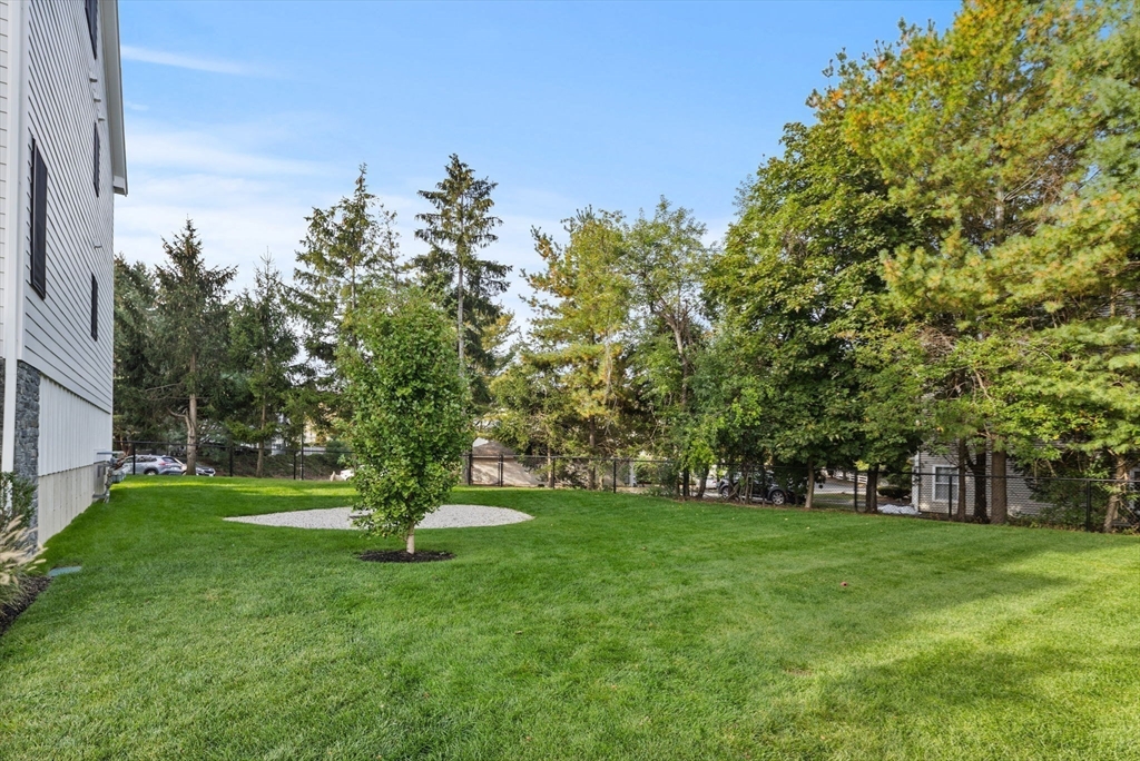 68 Prospect Street, Unit 14 Peabody, MA 01960 - Photo 25 of 29 a view of a park with large trees