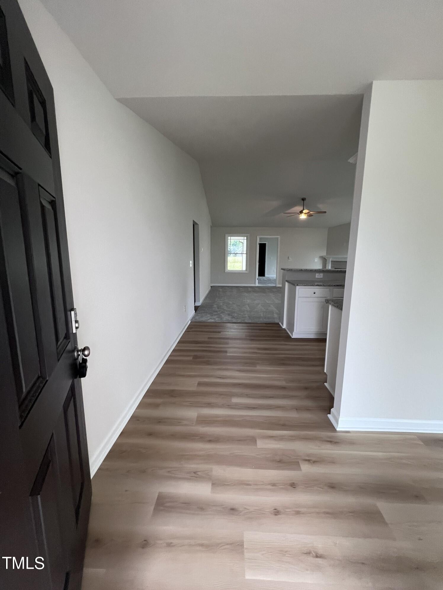 32 Scotties Ridge Drive Princeton, NC 27569 - Photo 4 of 24 a view of a kitchen from the hallway