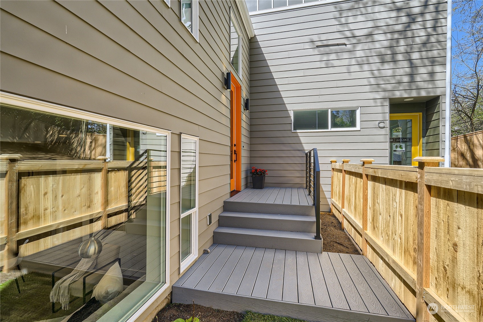 9524 3rd Avenue Northeast, Unit B Seattle, WA 98115 - Photo 19 of 21 a view of balcony with wooden floor and fence