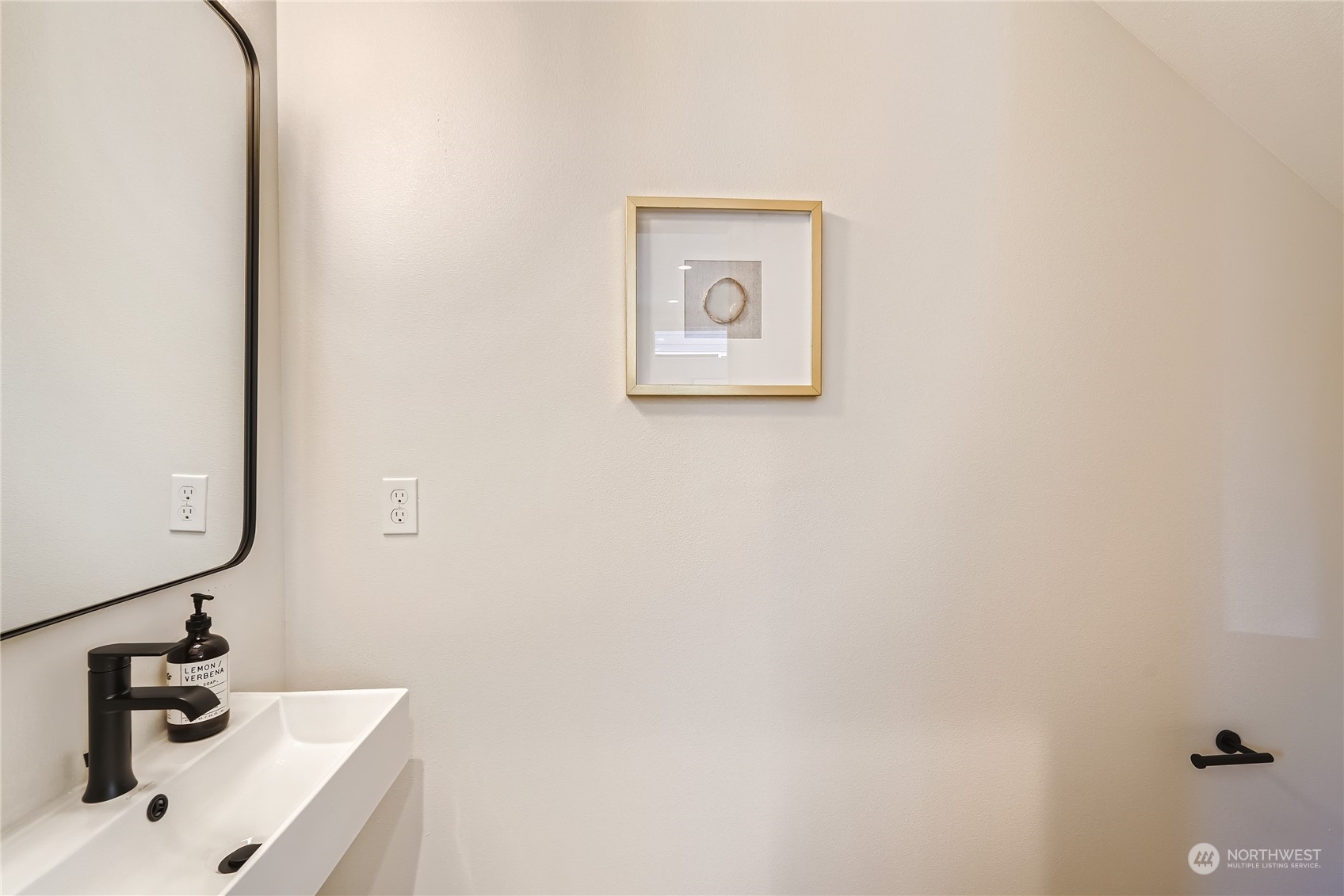 9524 3rd Avenue Northeast, Unit B Seattle, WA 98115 - Photo 6 of 21 a bathroom with a sink and a mirror