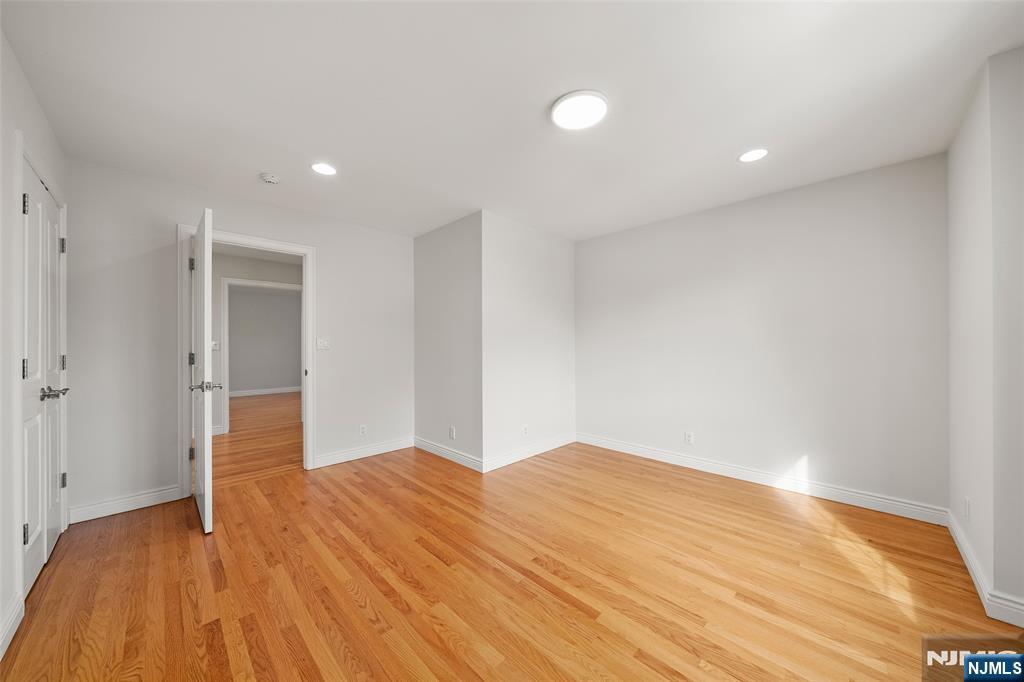 137 6th Street Cresskill, NJ 07626 - Photo 23 of 35 a view of empty room with wooden floor