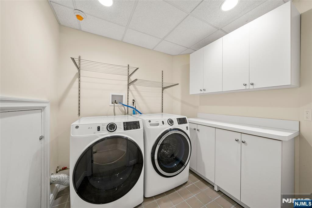 137 6th Street Cresskill, NJ 07626 - Photo 32 of 35 a utility room with dryer and washer