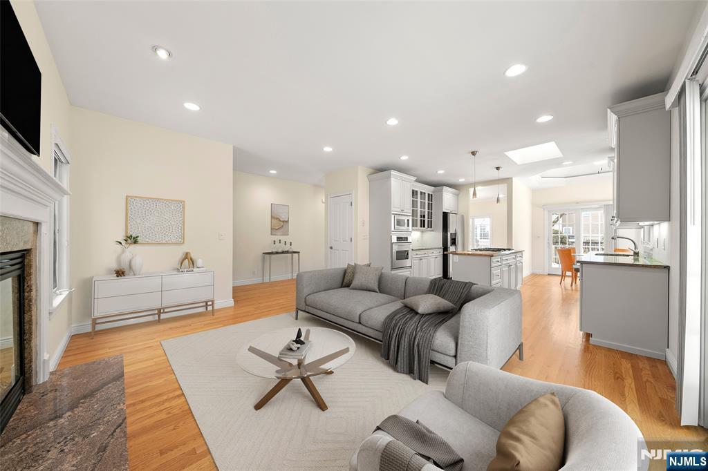 137 6th Street Cresskill, NJ 07626 - Photo 8 of 35 a living room with furniture and a flat screen tv