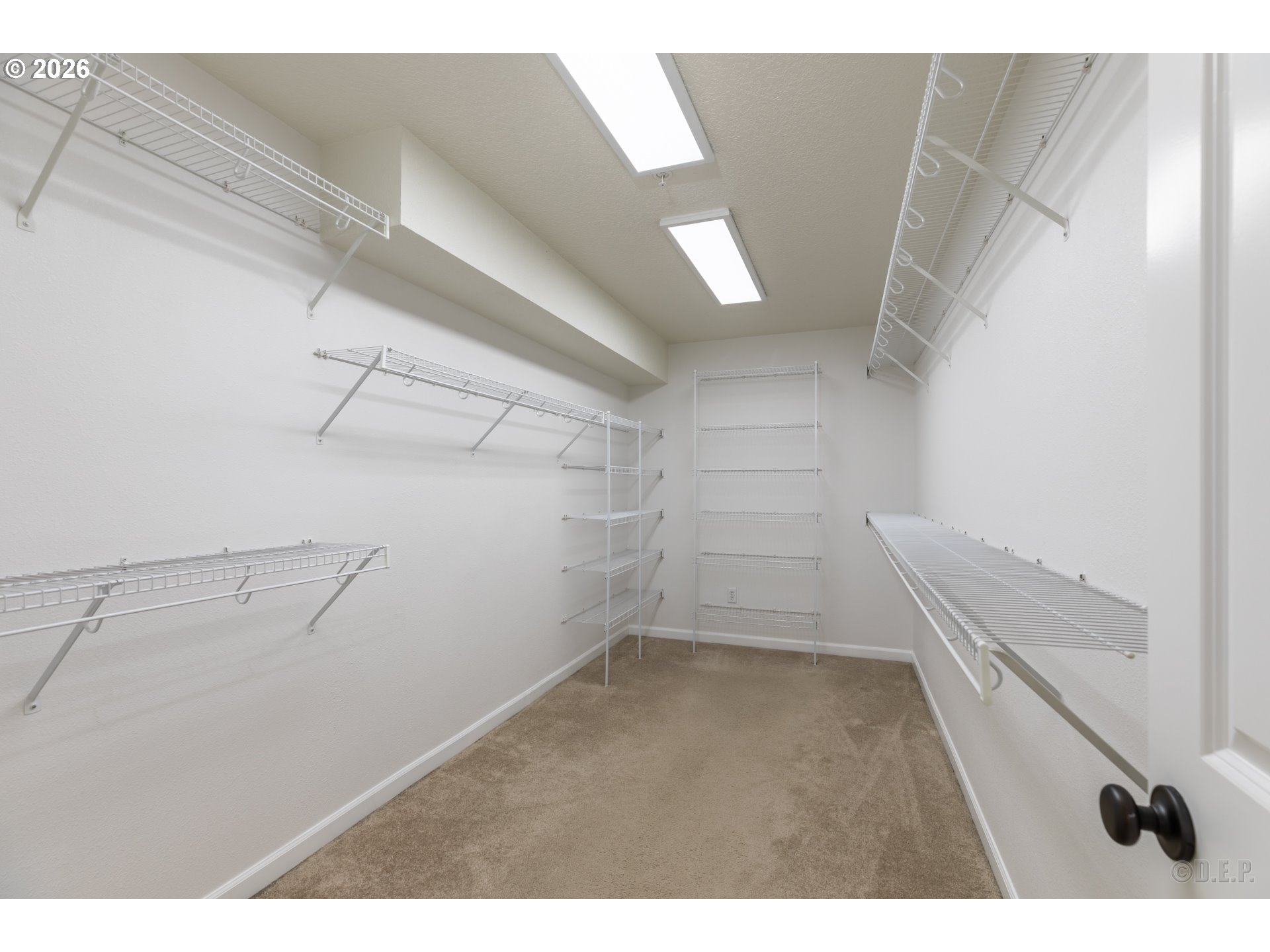 9161 Northwest Germantown Road Portland, OR 97231 - Photo 16 of 28 a view of a room with racks on the wall