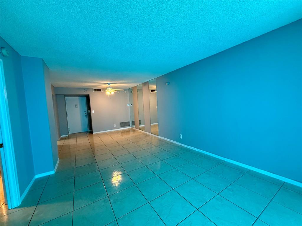 101 Briny Avenue, Unit 1606 Pompano Beach, FL 33062 - Photo 6 of 25 a view of an empty room