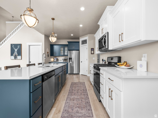 102 Elk Ridge Drive Elk Ridge, UT 84651 - Photo 10 of 61 Upgraded Kitchen with large island.