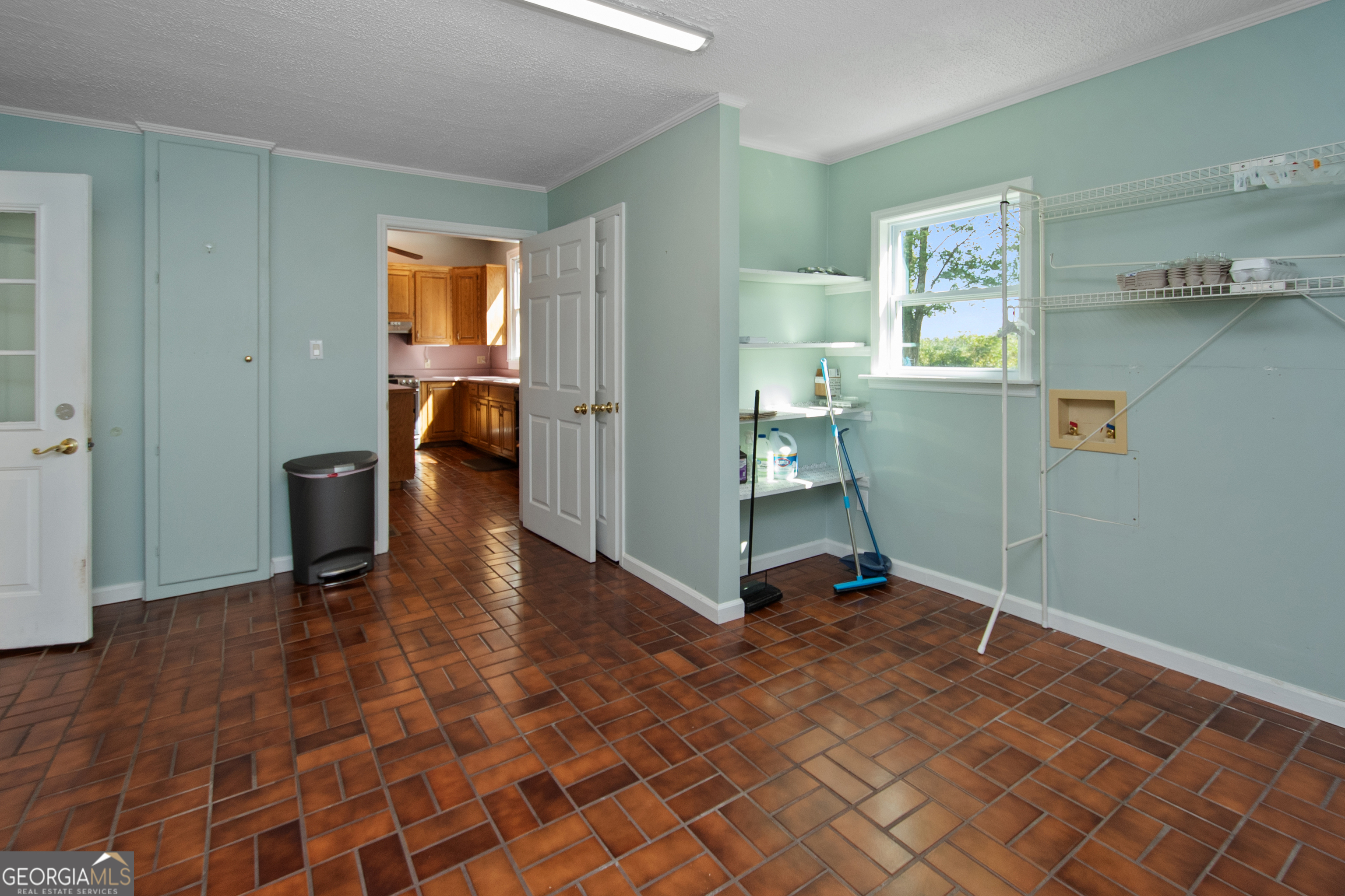 402 Tom Bell Road Milner, GA 30257 - Photo 16 of 64 a view of a livingroom with furniture and a window