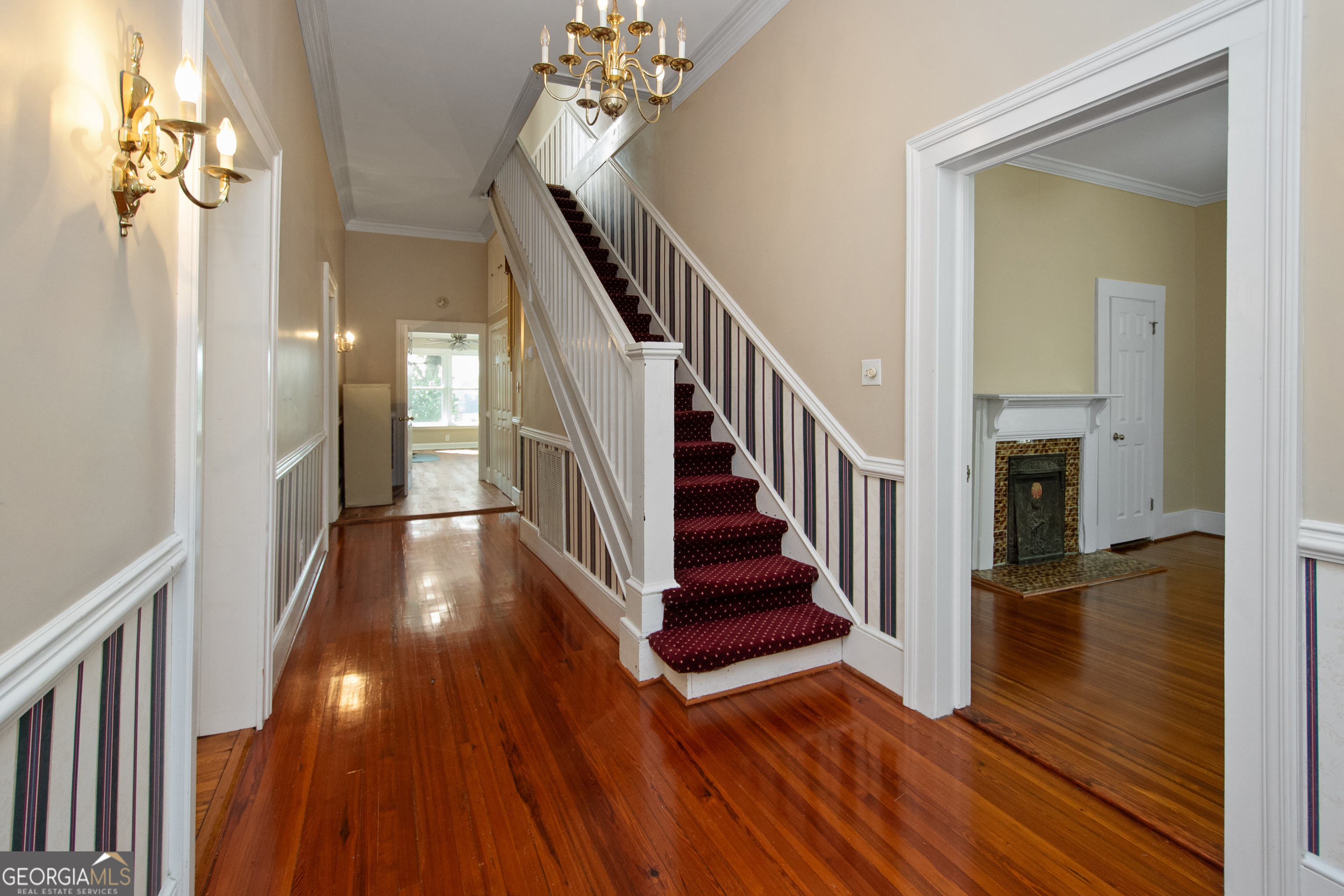 402 Tom Bell Road Milner, GA 30257 - Photo 4 of 64 a view of entryway and hall with wooden floor