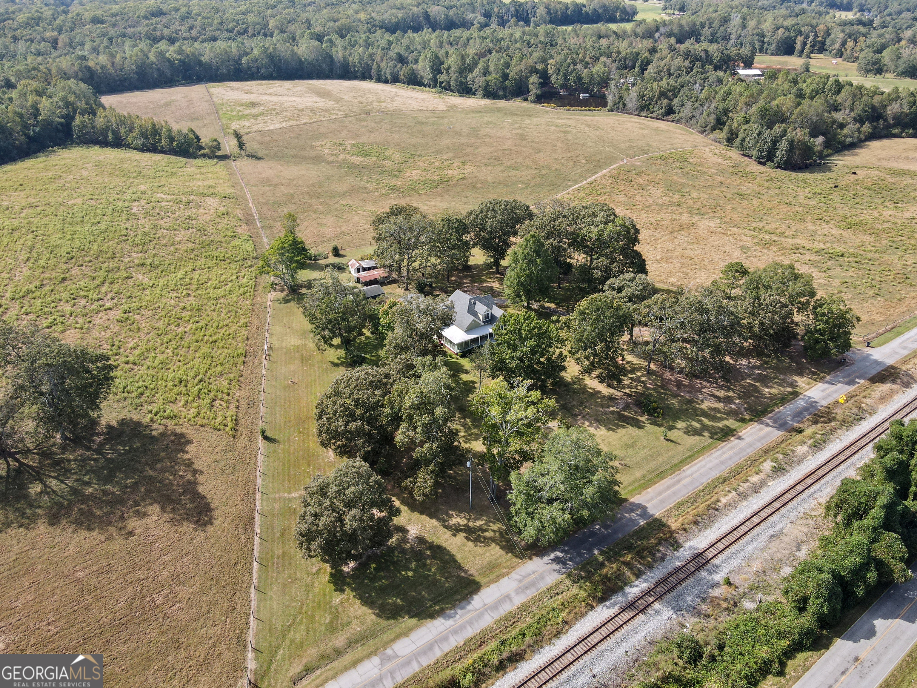 402 Tom Bell Road Milner, GA 30257 - Photo 63 of 64 a view of a yard with an outdoor space