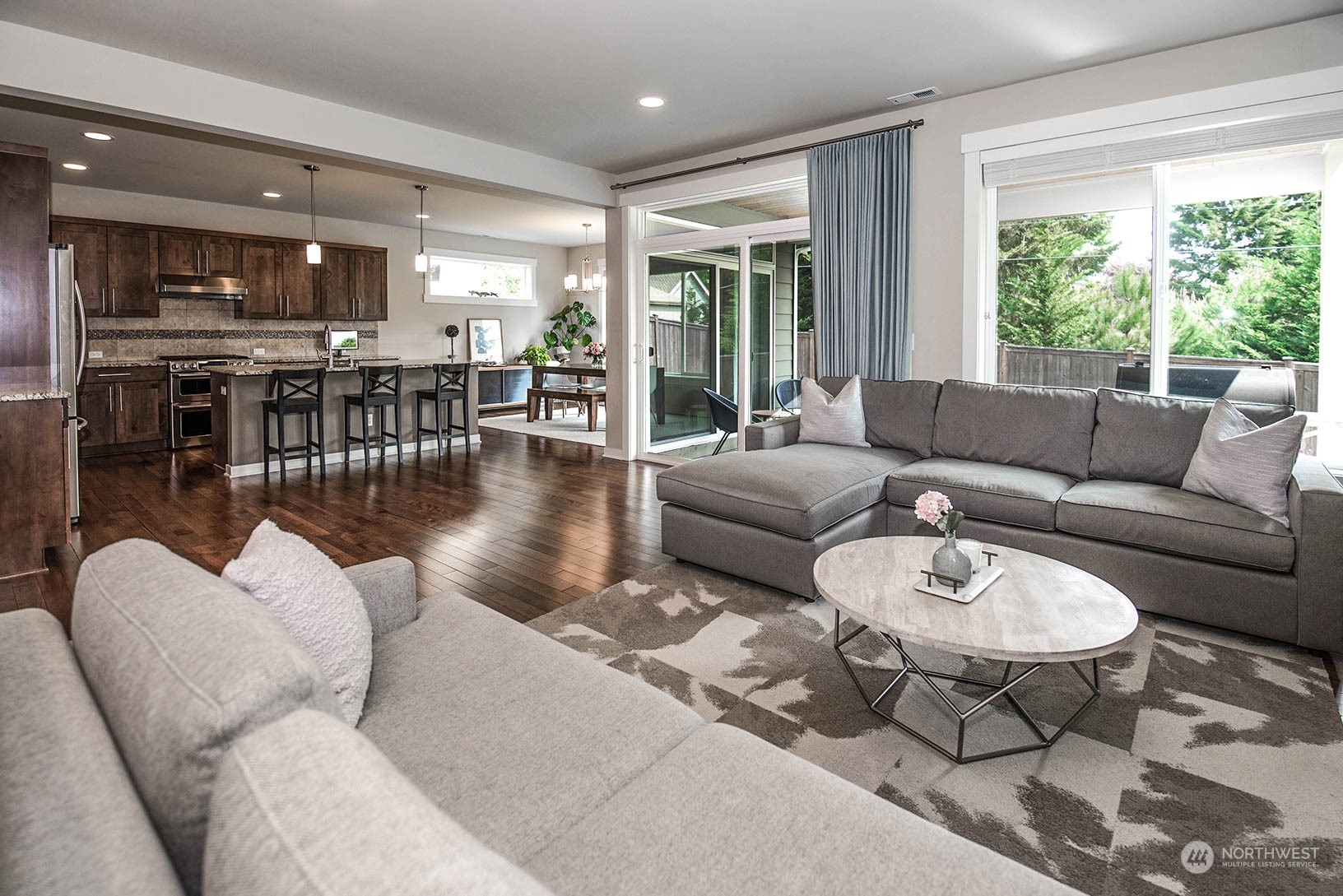 21127 35th Drive Southeast Bothell, WA 98021 - Photo 17 of 40 a living room with furniture and a large window
