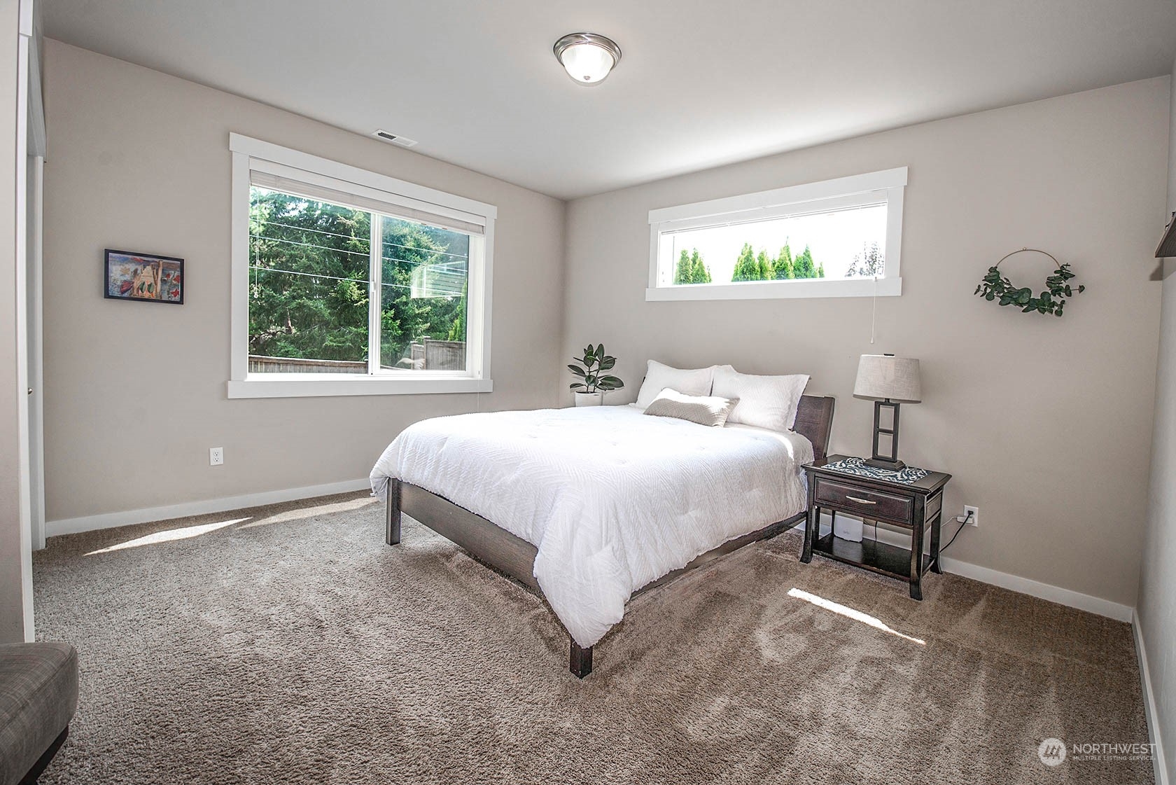 21127 35th Drive Southeast Bothell, WA 98021 - Photo 20 of 40 a bedroom with a bed and a window