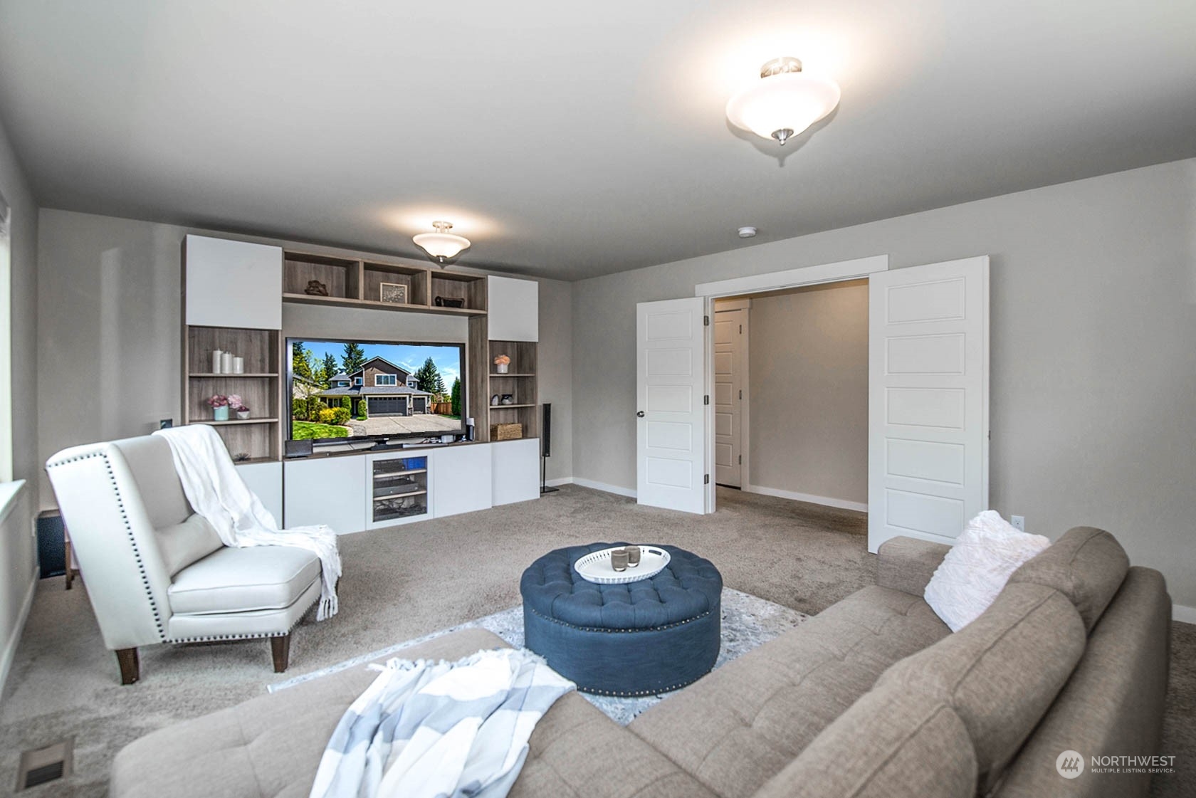 21127 35th Drive Southeast Bothell, WA 98021 - Photo 24 of 40 a living room with furniture and a painting