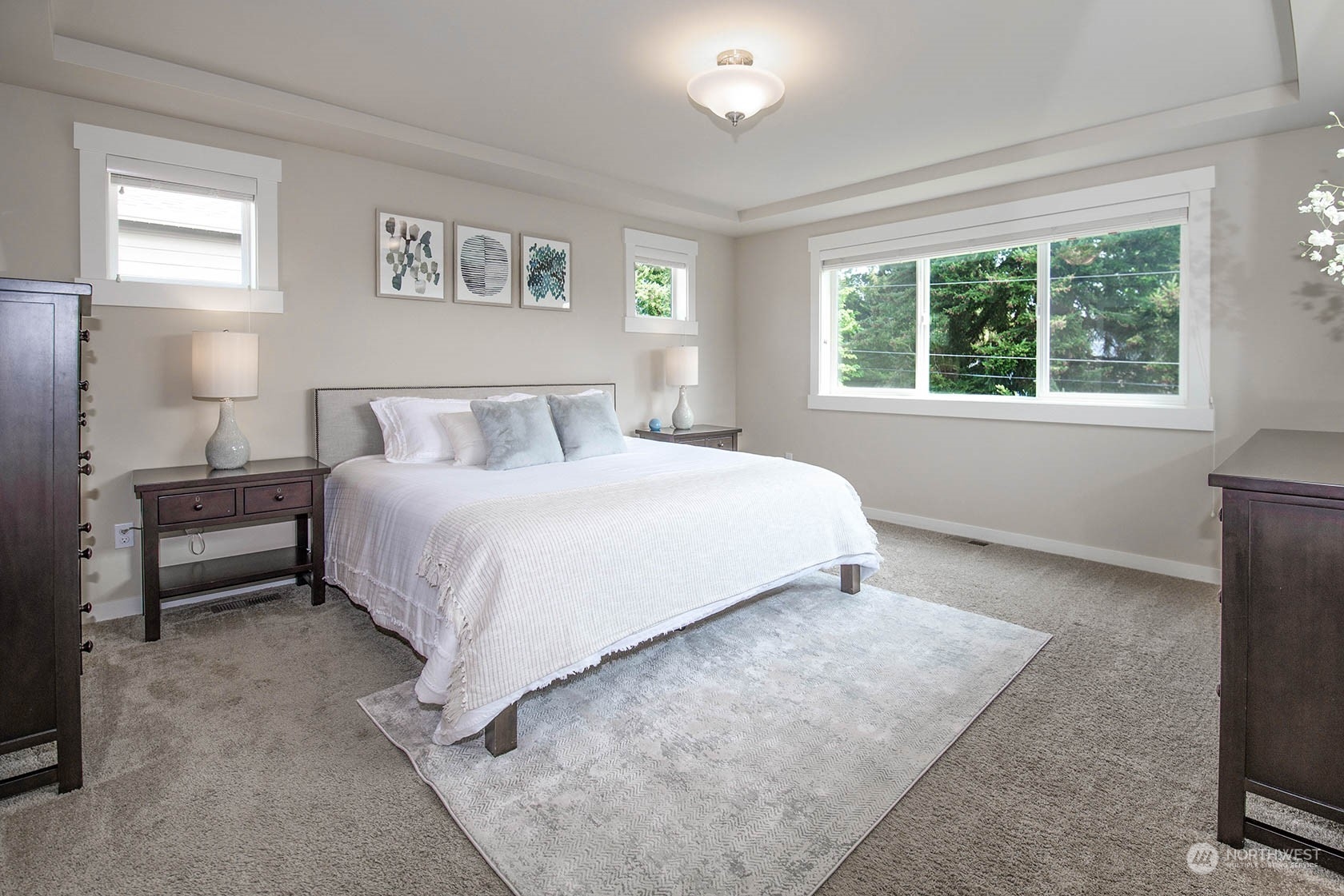 21127 35th Drive Southeast Bothell, WA 98021 - Photo 26 of 40 a bedroom with a bed and a table
