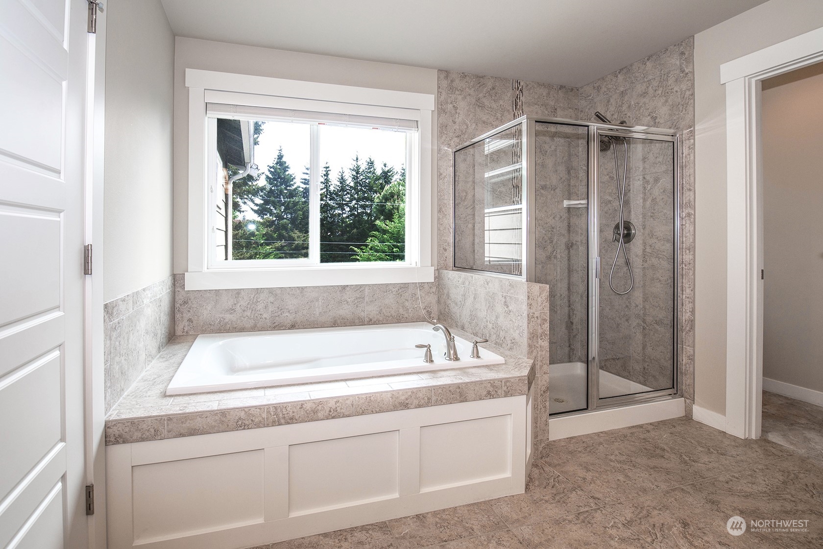 21127 35th Drive Southeast Bothell, WA 98021 - Photo 29 of 40 a bathroom with a tub shower and sink