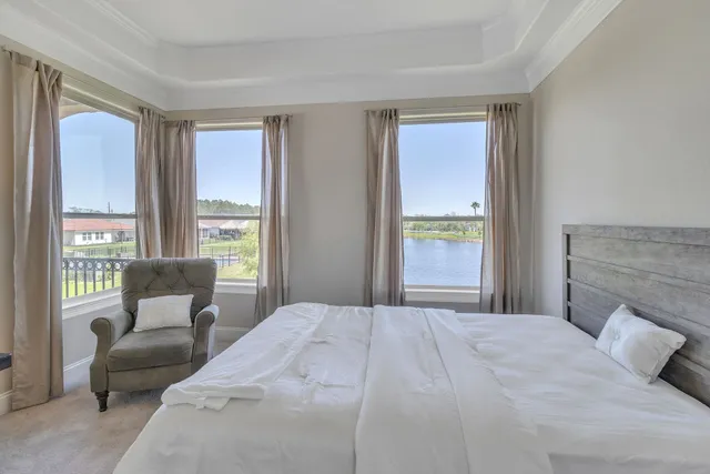 a bedroom with a bed and a fireplace