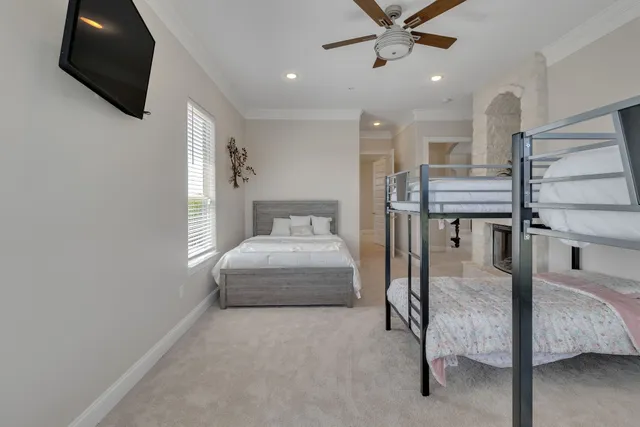 a bathroom with a granite countertop sink a large mirror and vanity