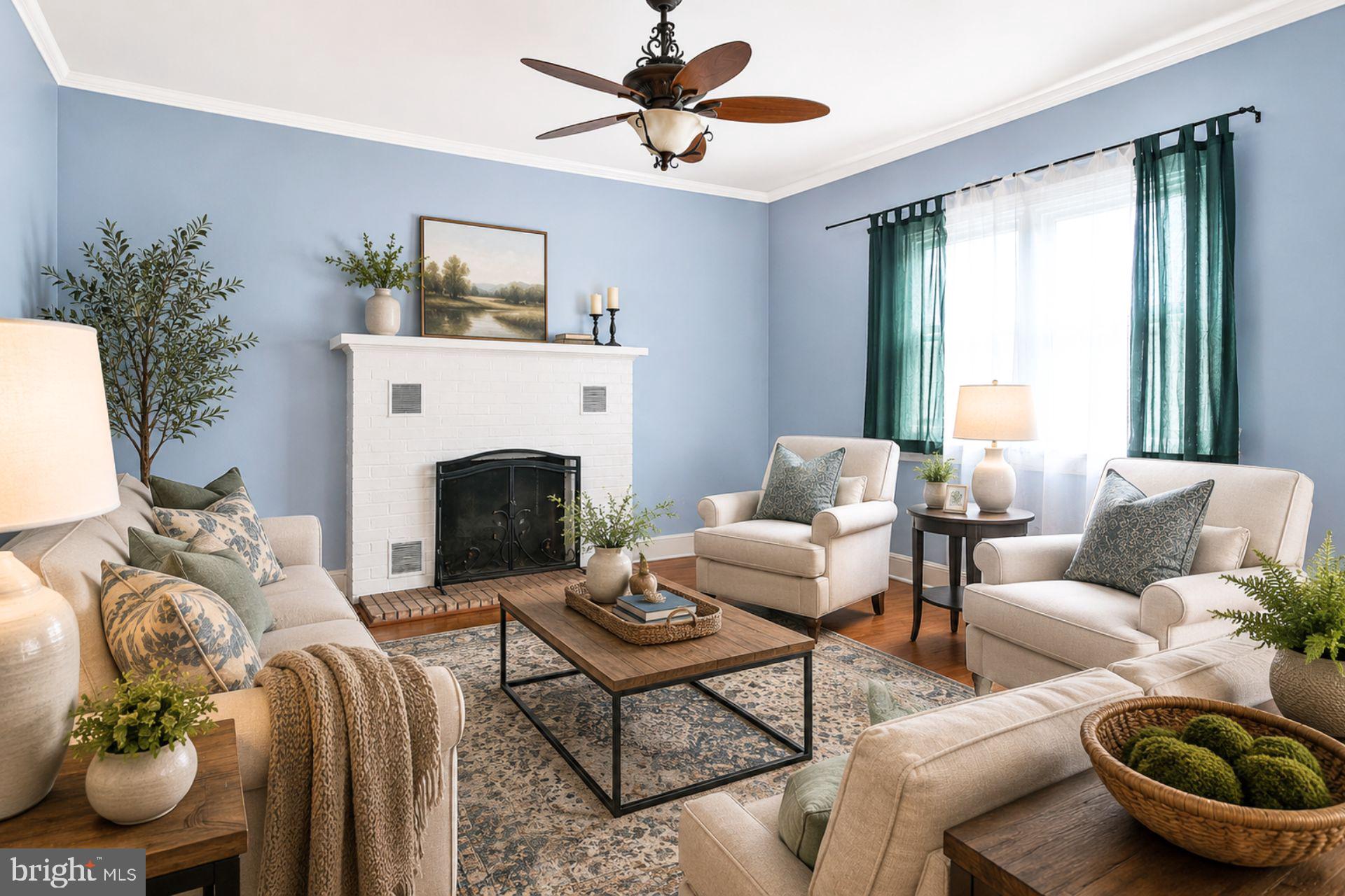 8965 Poorhouse Road Port Tobacco, MD 20677 - Photo 4 of 18 a living room with furniture a fireplace and a window