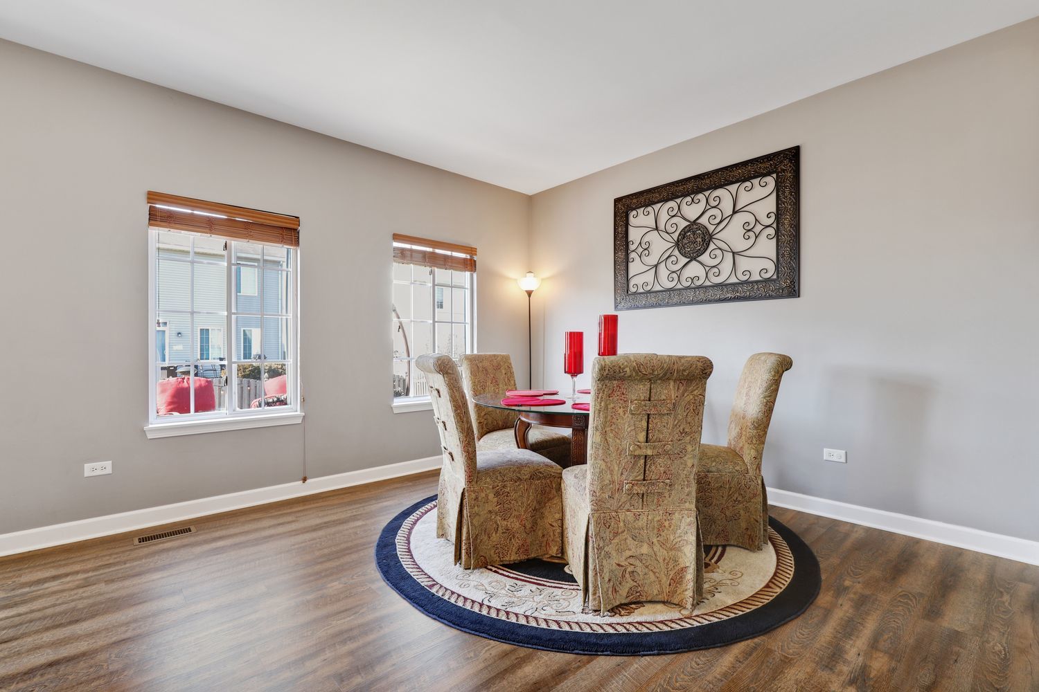 1441 Red Top Lane Minooka, IL 60447 - Photo 6 of 24 a view of a dining room with furniture and wooden floor