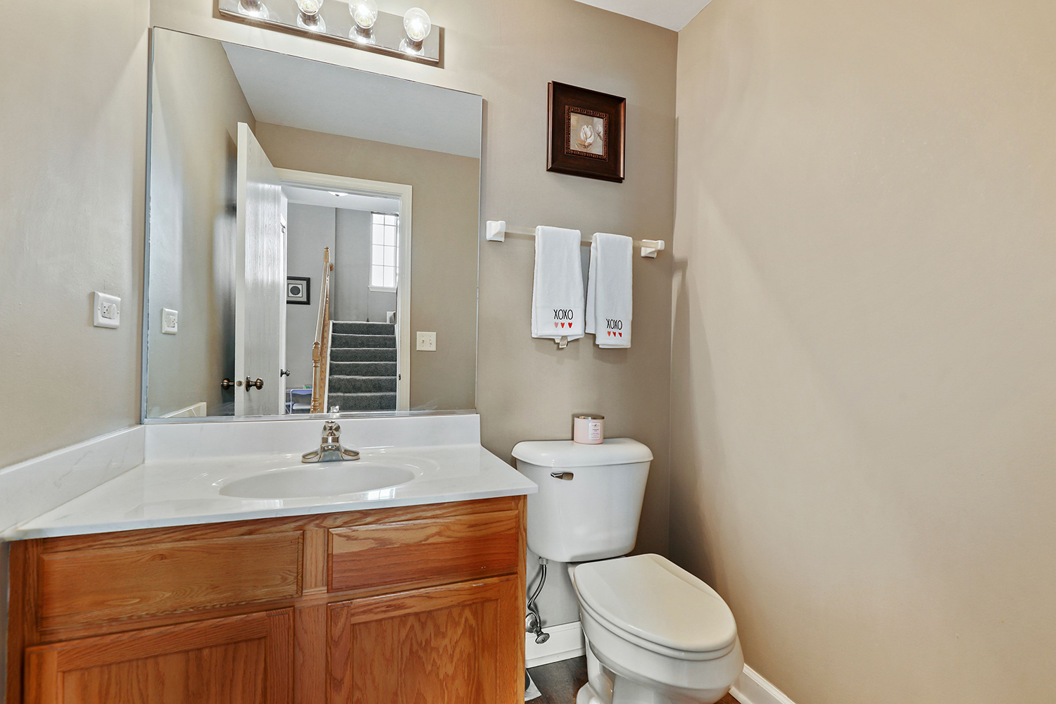 1441 Red Top Lane Minooka, IL 60447 - Photo 9 of 24 a bathroom with a sink a toilet and mirror