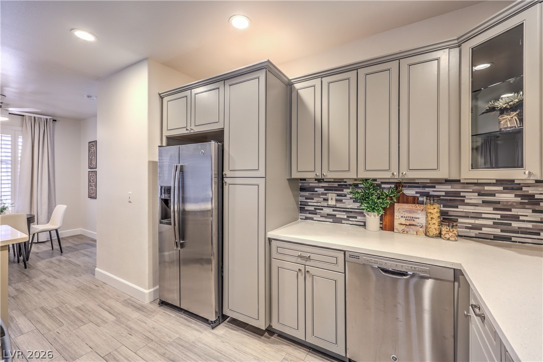 2050 West Warm Springs Road, Unit 1421 Henderson, NV 89014 - Photo 18 of 45 Culinary delights await in this modern kitchen with extensive counter space and sleek stainless appliances.