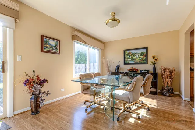 a view of a livingroom with furniture window and wooden floor