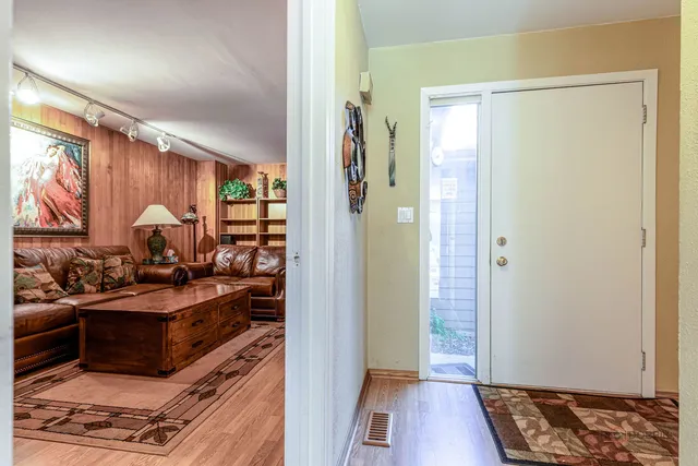 a view of kitchen with furniture and a window
