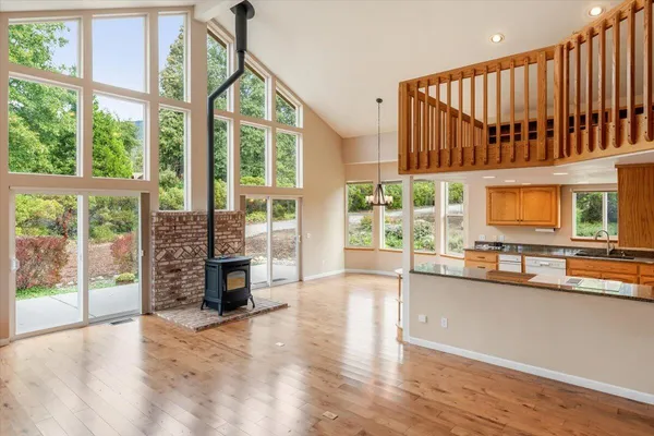 a view of a living room and windows