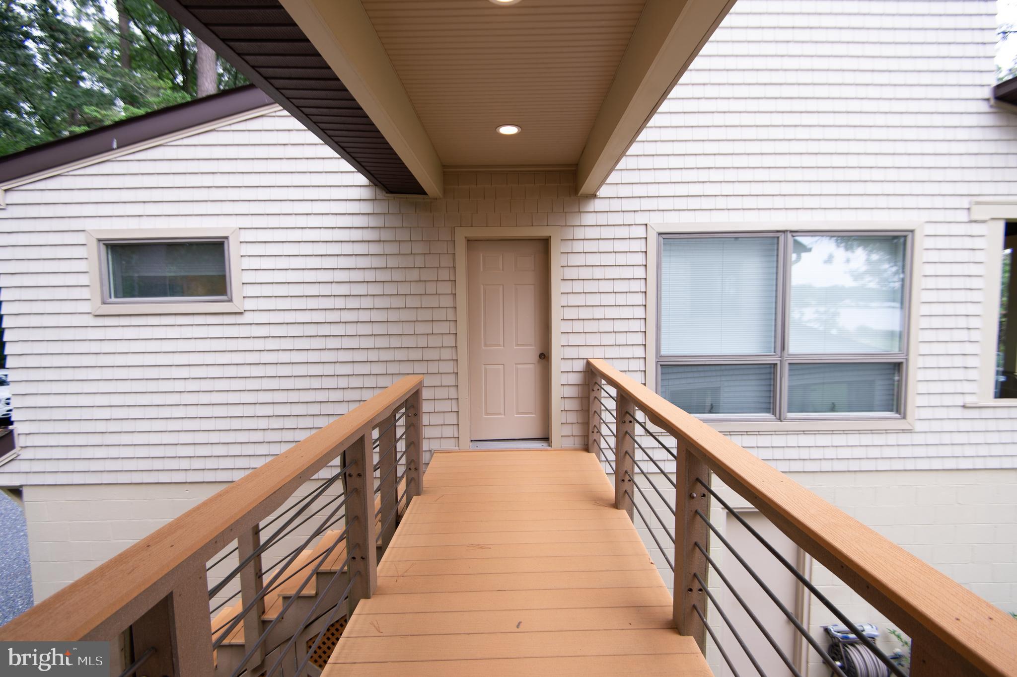 1701 Perseus Road Cambridge, MD 21613 - Photo 40 of 85 walkway to guest house
