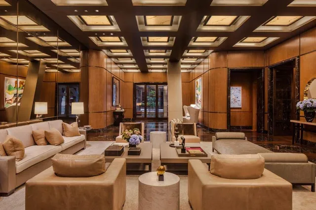 a view of swimming pool with a lounge chair