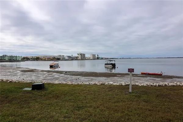 a view of street with parked cars