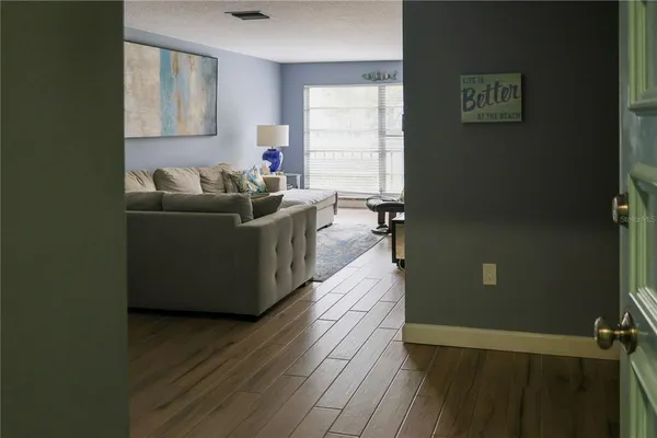 a living room with furniture and a window