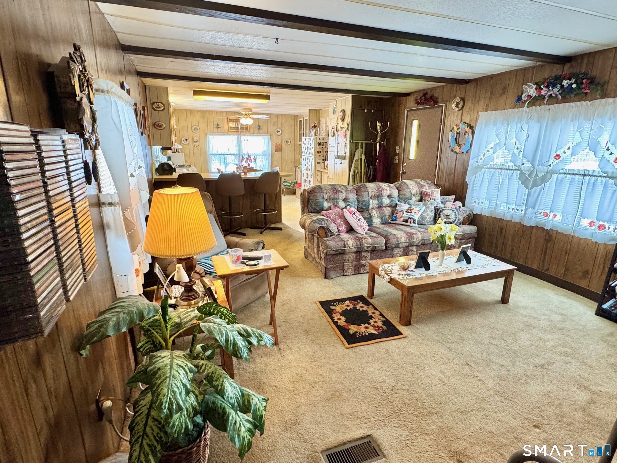 1070 Amity Road Bethany, CT 06524 - Photo 6 of 14 a living room with patio furniture and a floor to ceiling window