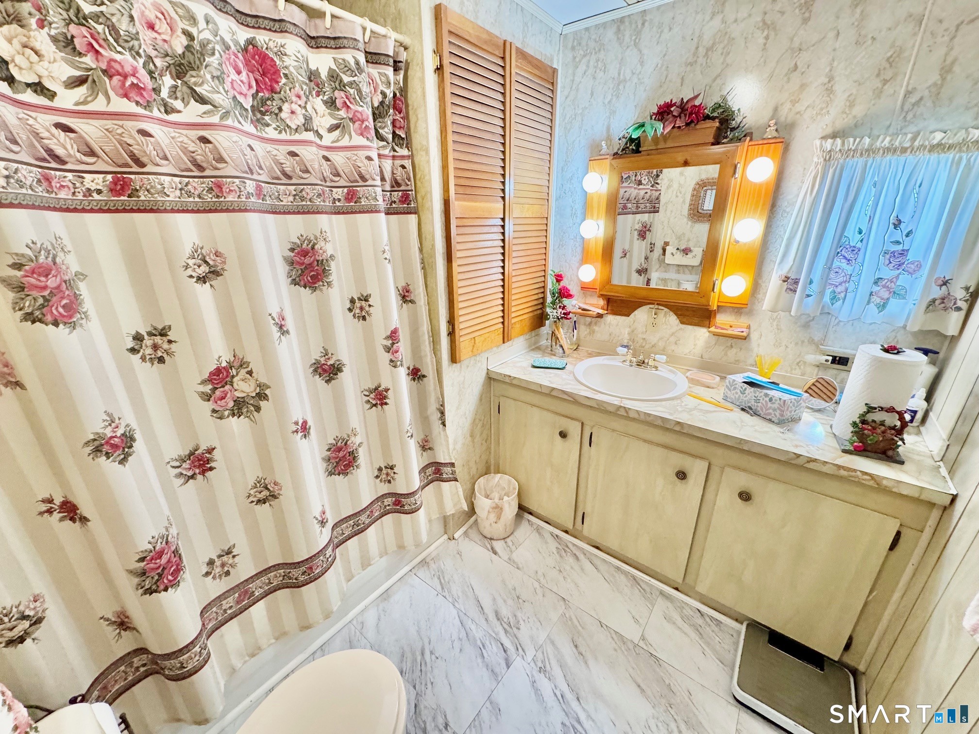 1070 Amity Road Bethany, CT 06524 - Photo 8 of 14 a bathroom with a sink mirror vanity and toilet