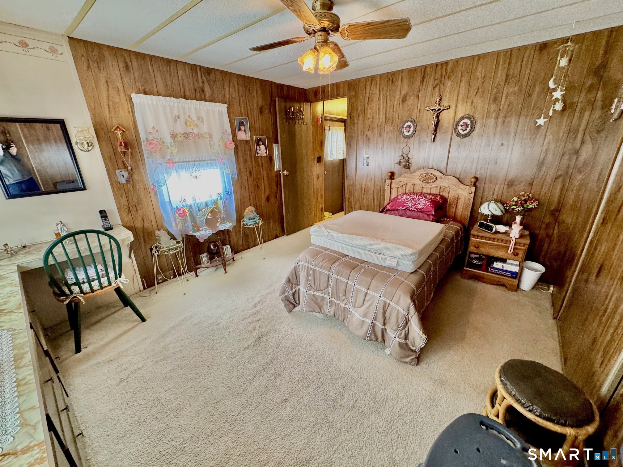 1070 Amity Road Bethany, CT 06524 - Photo 10 of 14 a living room with furniture and a large mirror