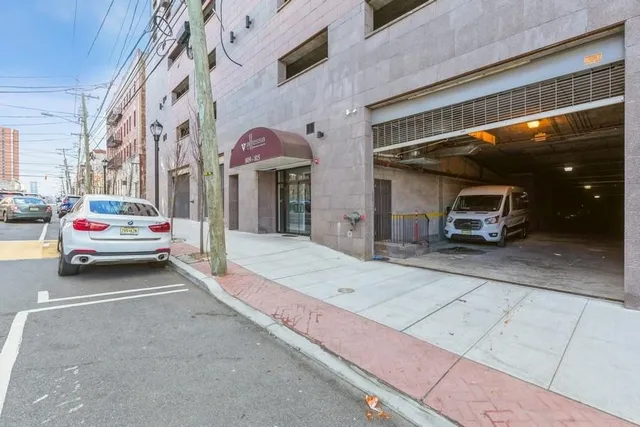 a view of a car park in front of building