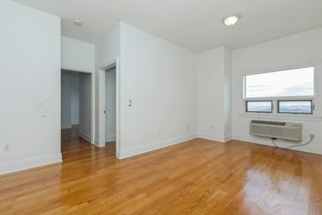a view of a kitchen with a sink cabinets and a window