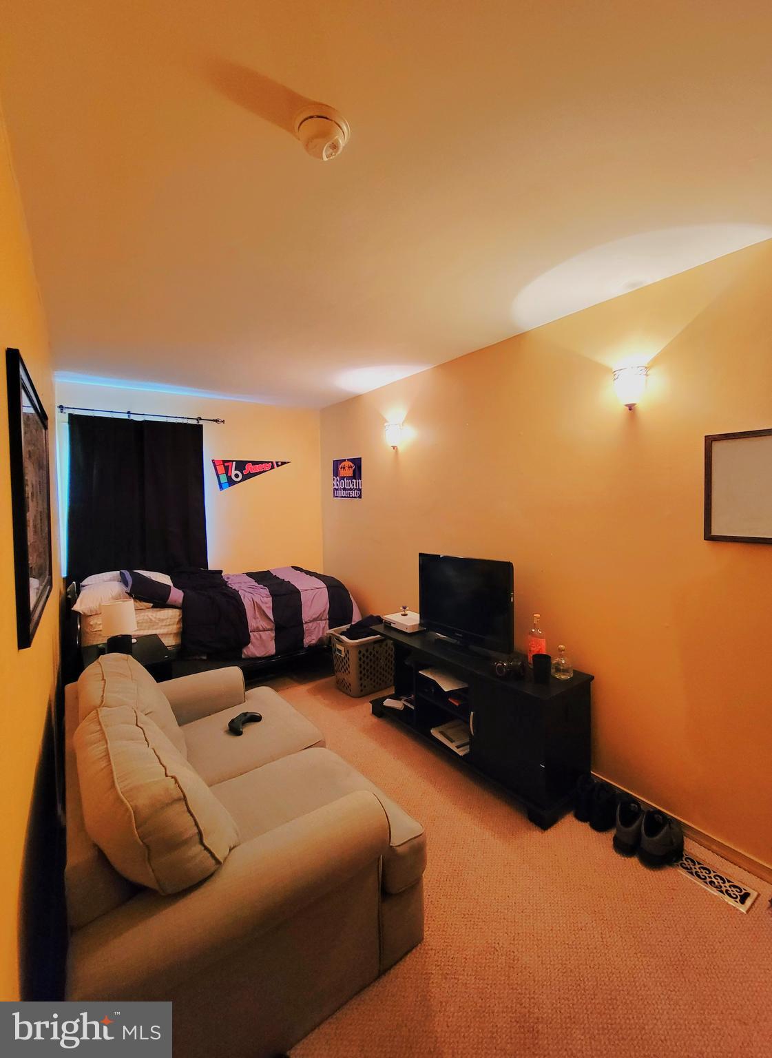 2 Virginia Road Glassboro, NJ 08028 - Photo 11 of 17 a living room with furniture and a flat screen tv
