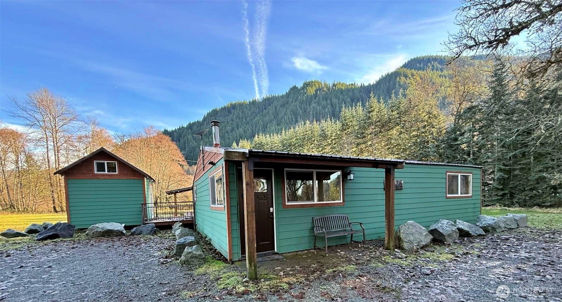 128 Kauer Road Randle, WA 98377 - Photo 2 of 20 a backyard of a house with lots of green space