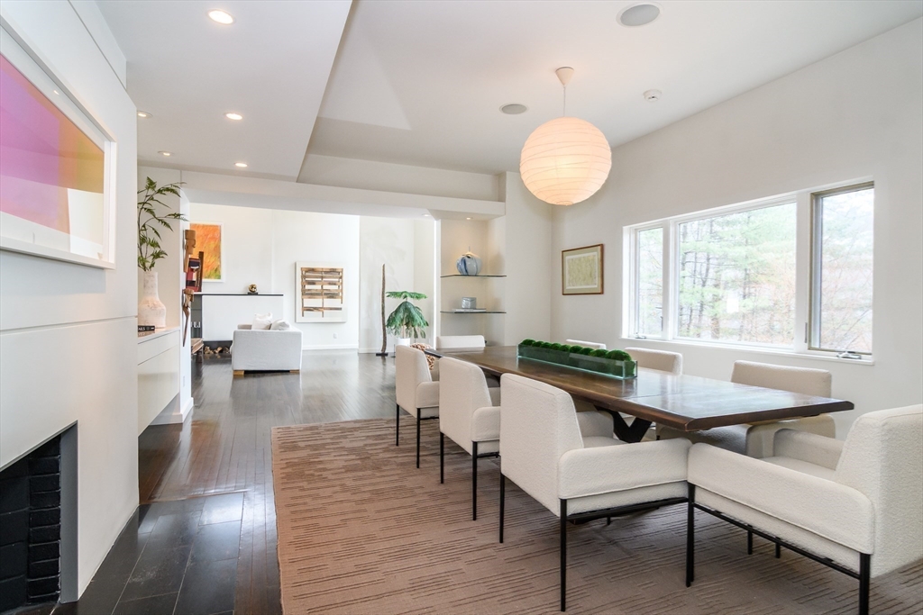 41 Grove Street Wayland, MA 01778 - Photo 5 of 24 a view of a dining room with furniture and wooden floor