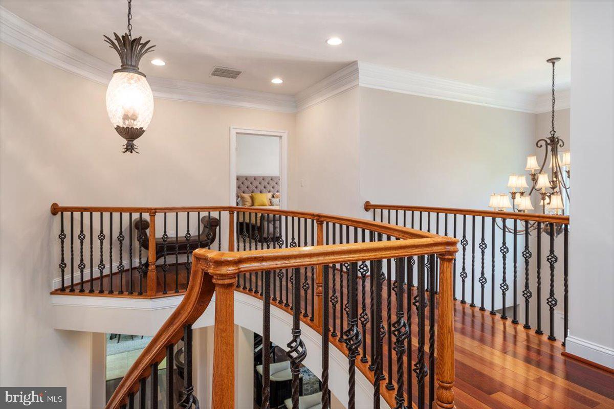 860 Governor Bridge Road Davidsonville, MD 21035 - Photo 39 of 68 Iron balusters compliment the winding staircase