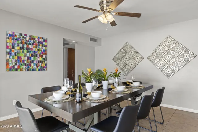 a view of a dining room with furniture window and outside view