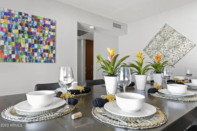 a living room with a couch and a table