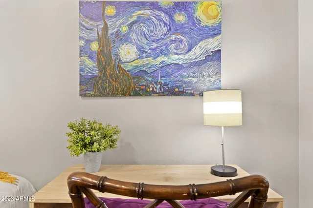 a view of a swimming pool with a lounge chairs