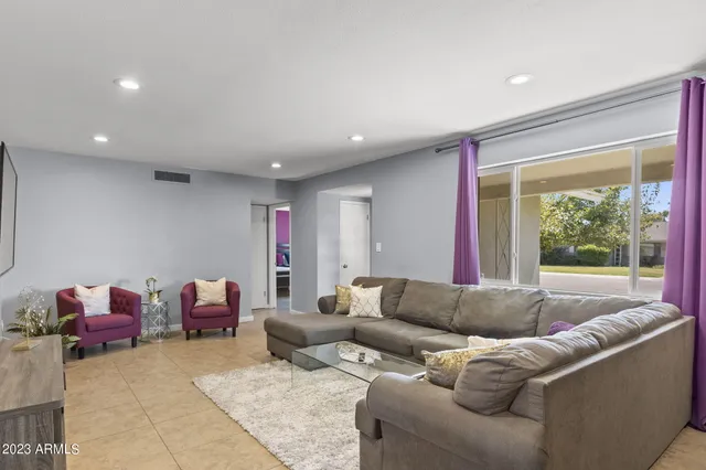 a living room with furniture and a couch