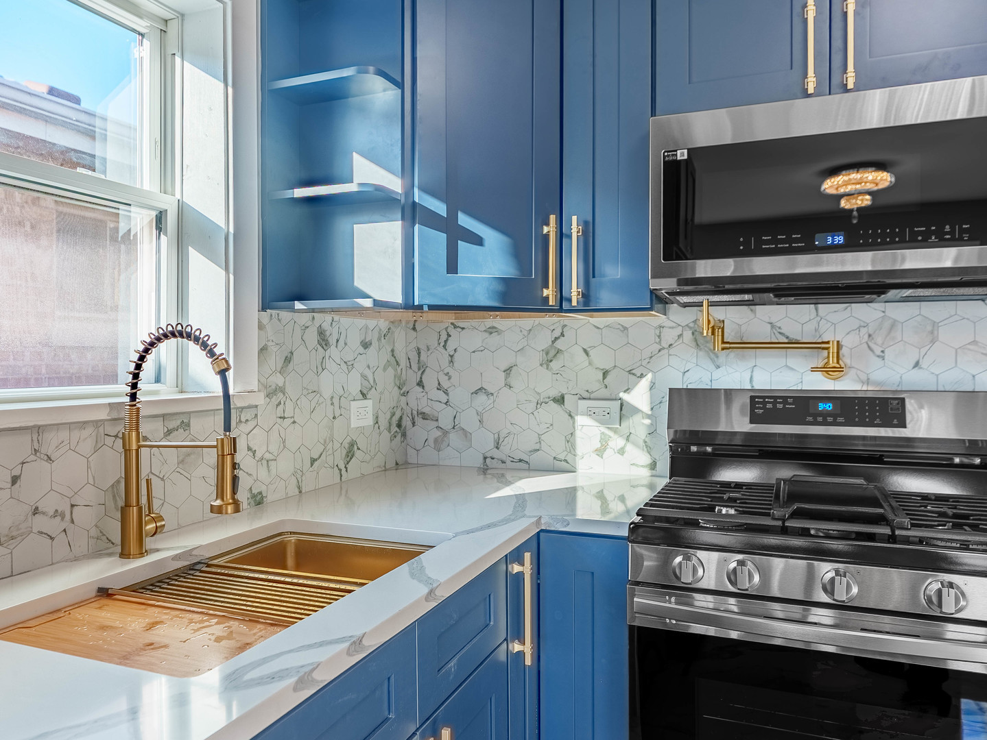 3053 West 77th Street Chicago, IL 60652 - Photo 13 of 24 a stove top oven sitting inside of a kitchen