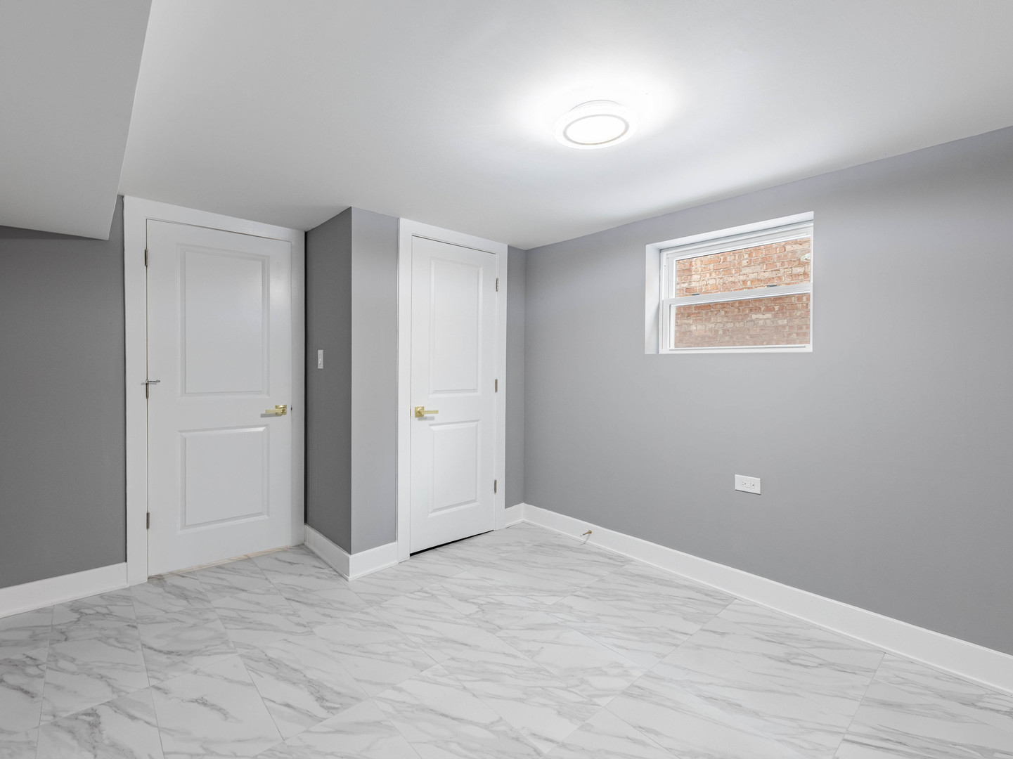 3053 West 77th Street Chicago, IL 60652 - Photo 21 of 24 a view of an empty room with wooden floor and a window