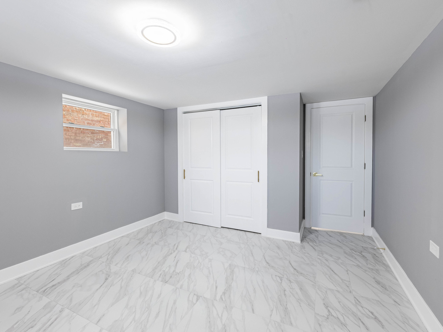 3053 West 77th Street Chicago, IL 60652 - Photo 22 of 24 an empty room with wooden floor and closet