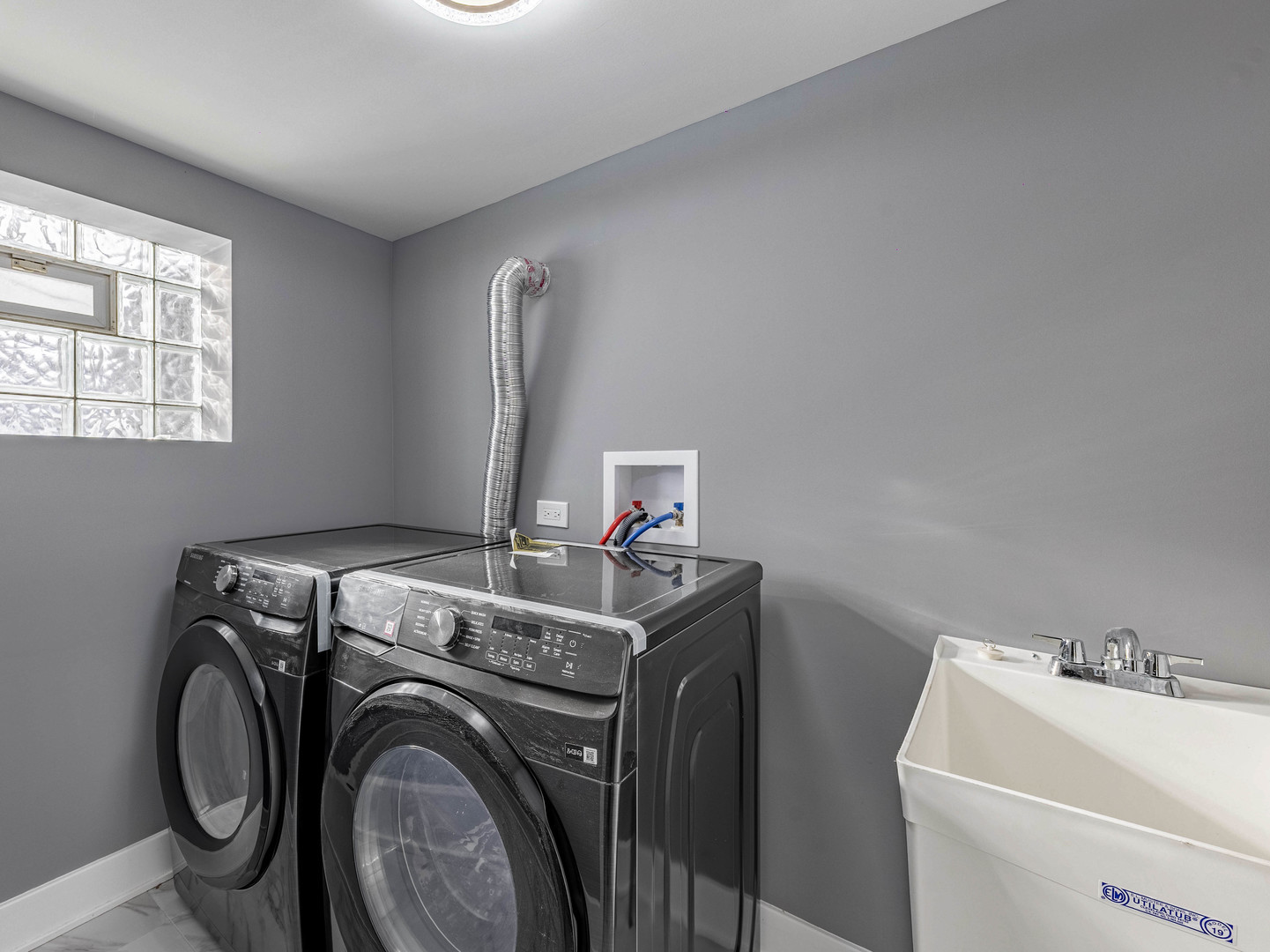 3053 West 77th Street Chicago, IL 60652 - Photo 23 of 24 a utility room with dryer and washer