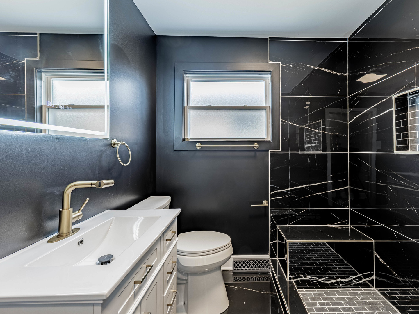 3053 West 77th Street Chicago, IL 60652 - Photo 9 of 24 a bathroom with a toilet and a sink